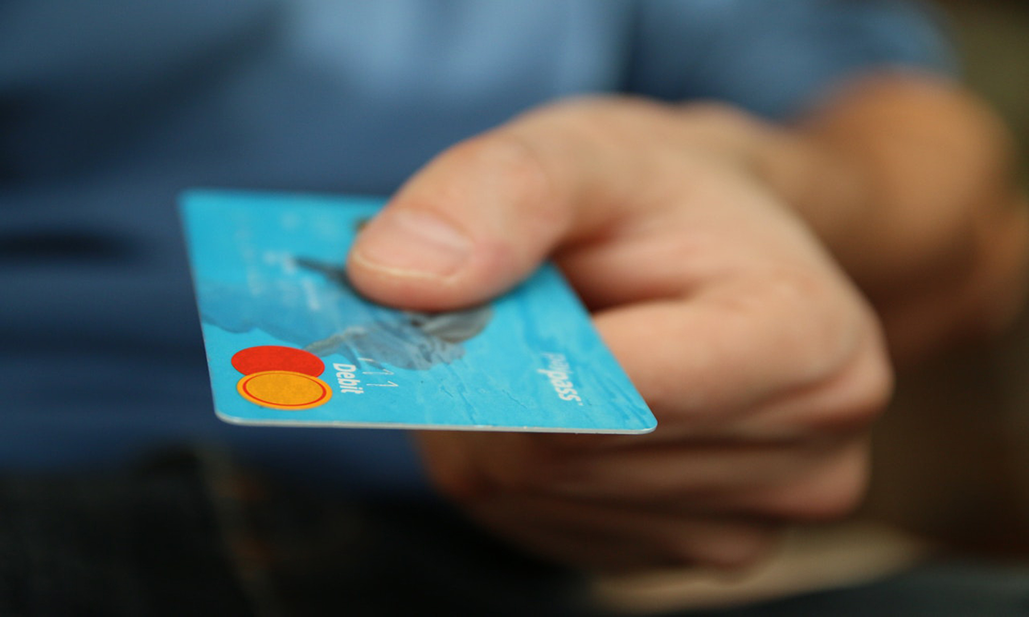 Man using card at bank